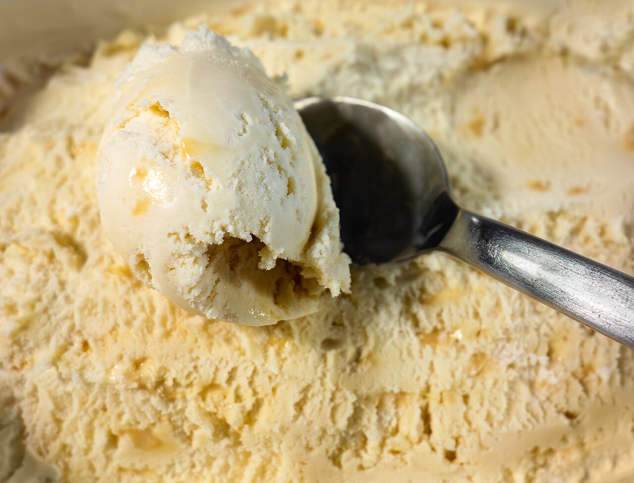 A scoop of ice cream in a bowl